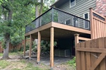 How Does Local Climate (Minnesota / Twin Cities) Impact Deck Material Selection and Construction?